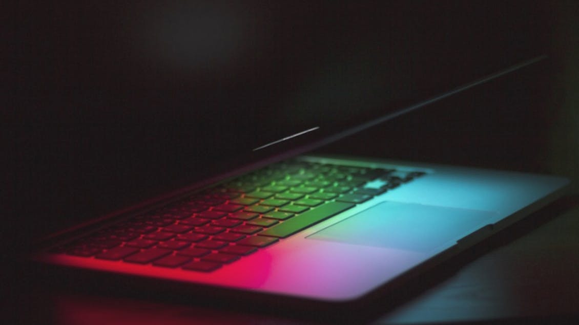 a computer with colored lights