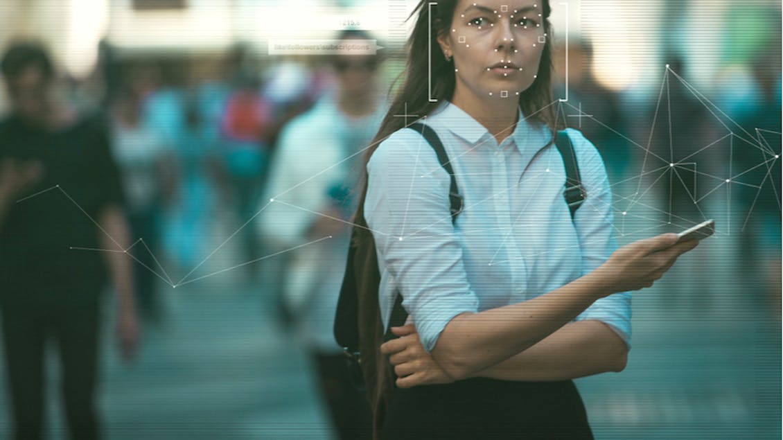 A woman being identified with modern digital technologies