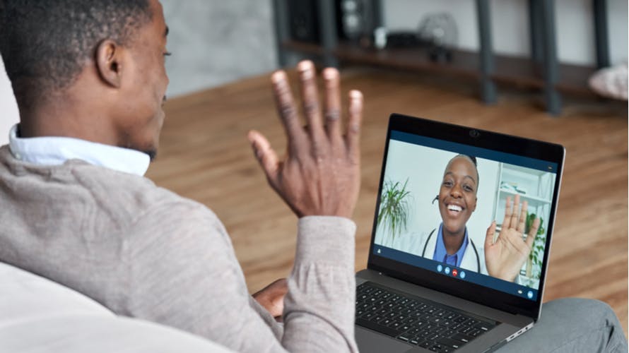 A man on a virtual conference with his doctor