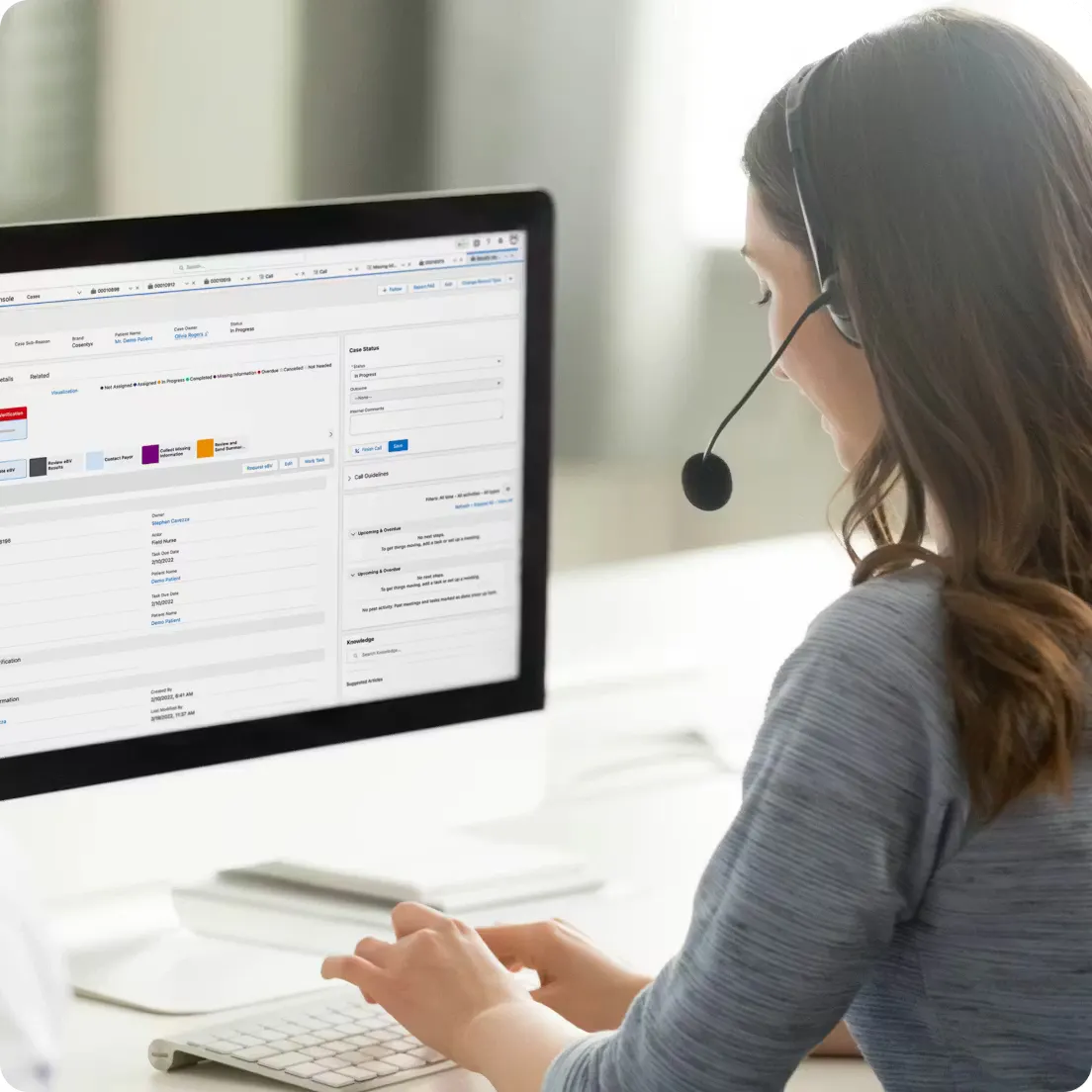Woman working at call center looking at Novartis dashboard