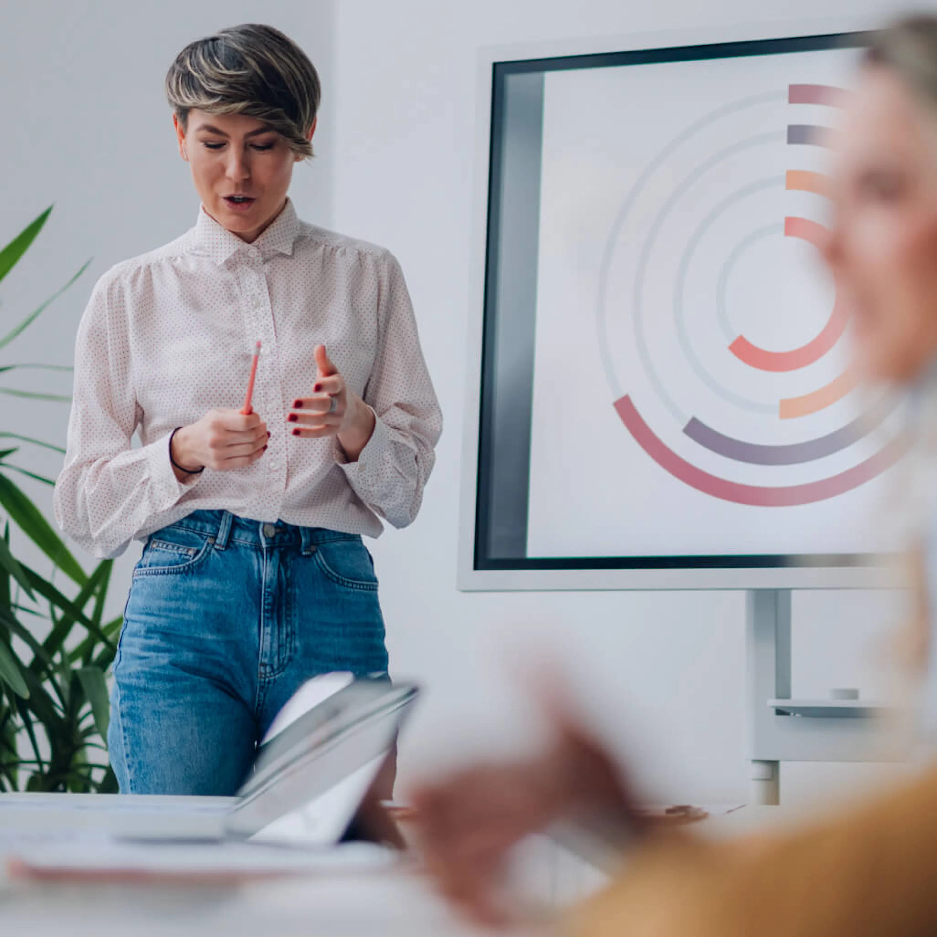 Woman presenting to a room