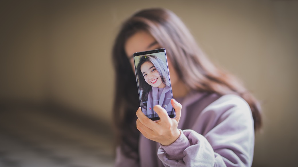 woman taking selfie