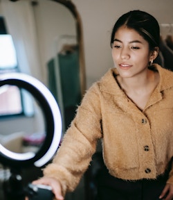 woman filming fashion video