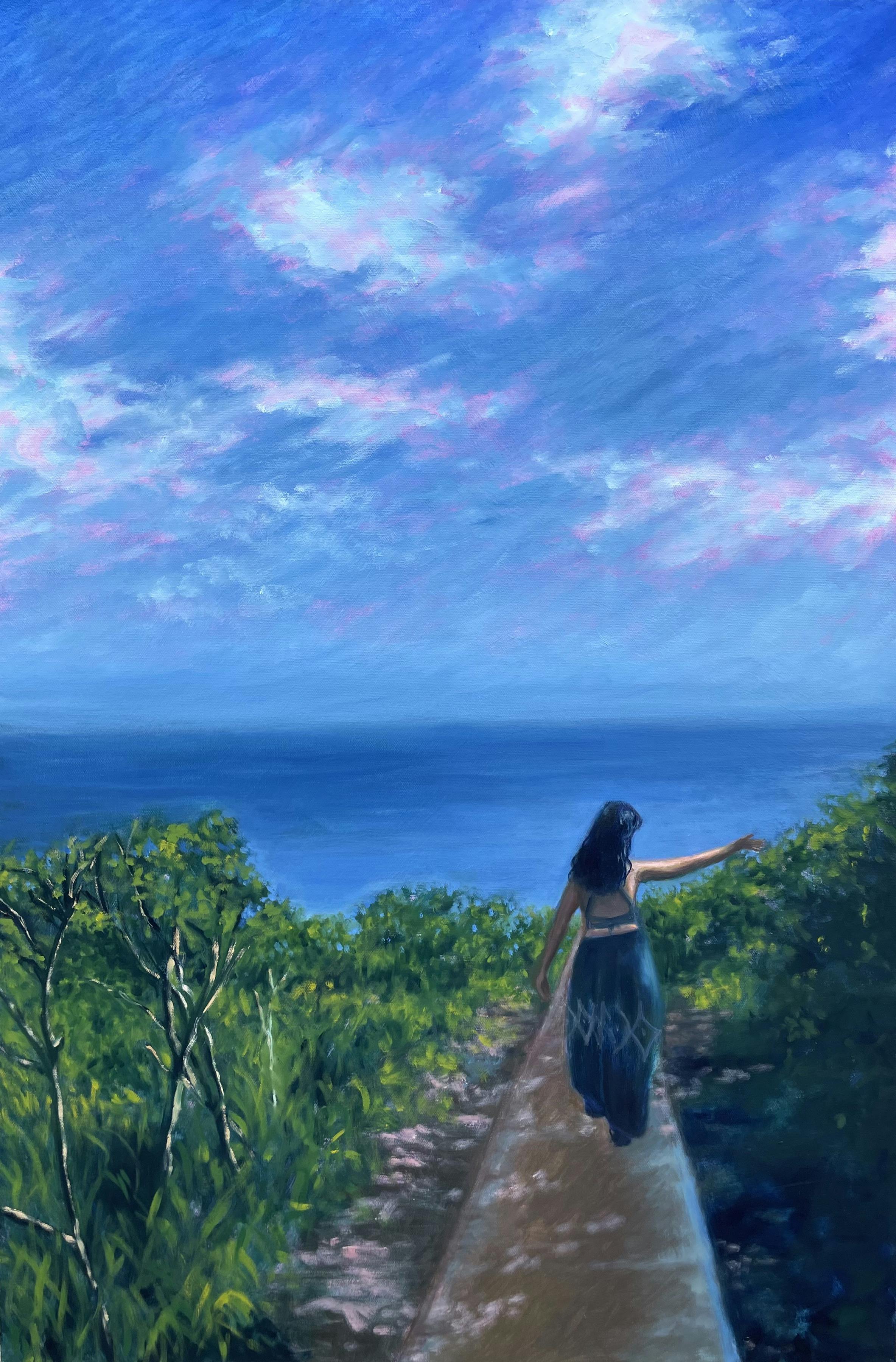 woman walking down a path leading to ocean with foliage on both sides with arm extend