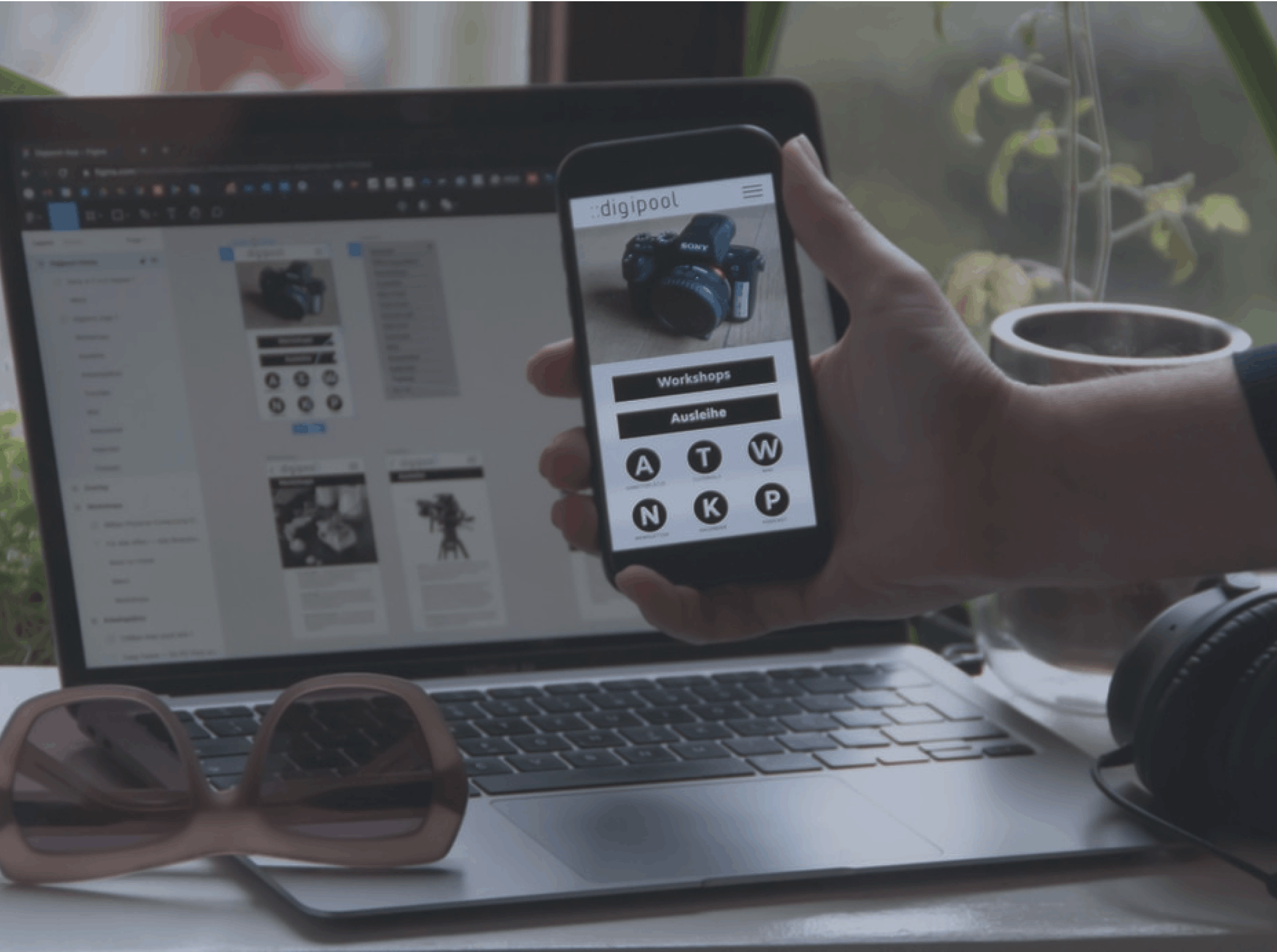 Hand holding a phone with a mobile site mockup
