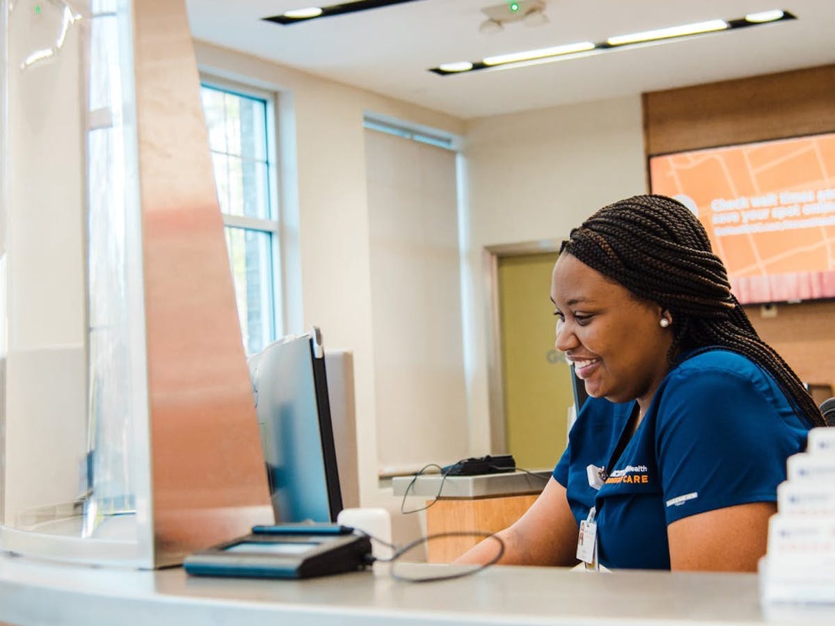GoHealth receptionist at desk
