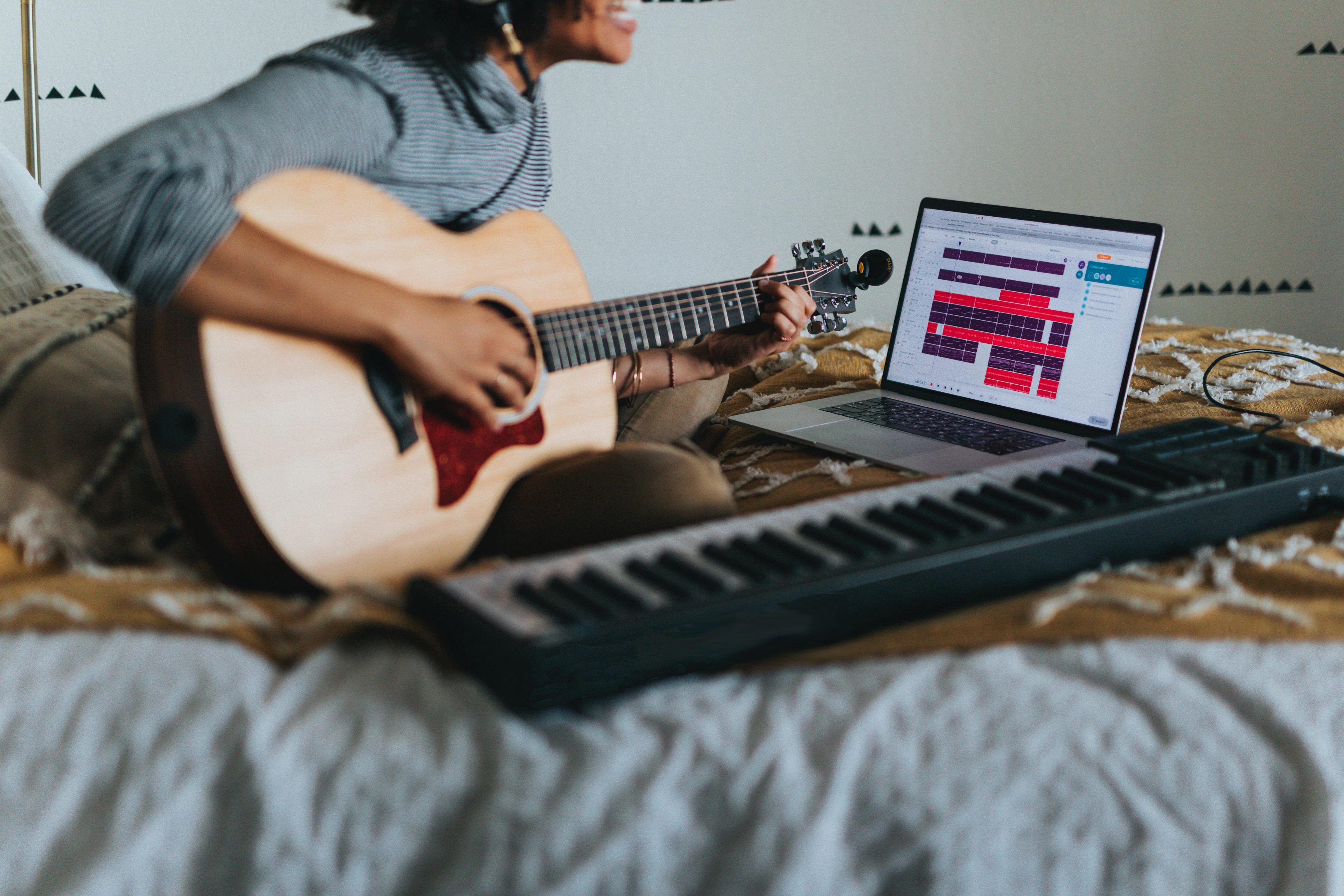adult playing guitar