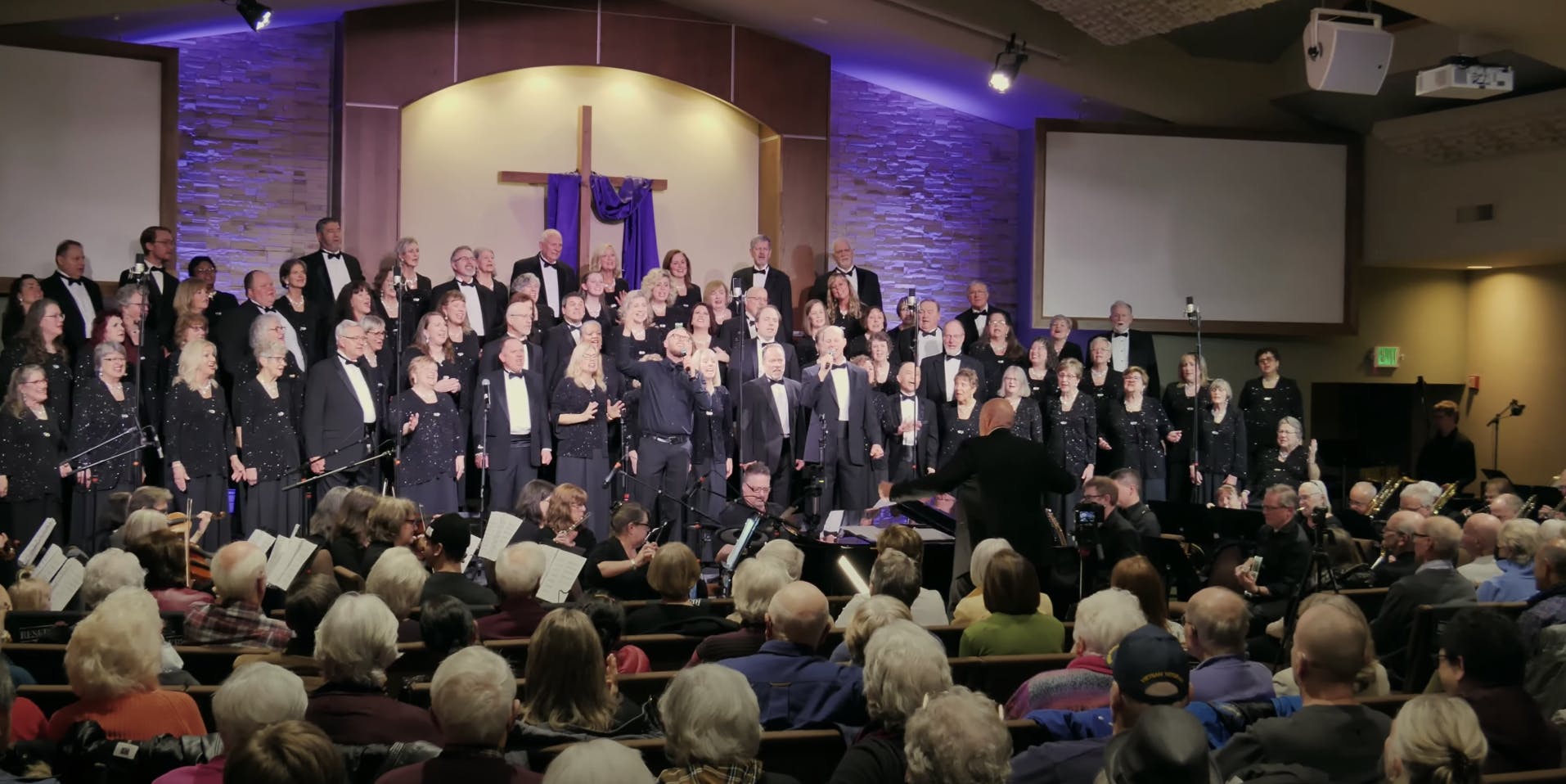 Mosaic Performing on the stage of a Church