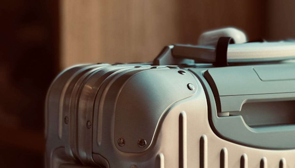 A travel sitcase with a blurry background