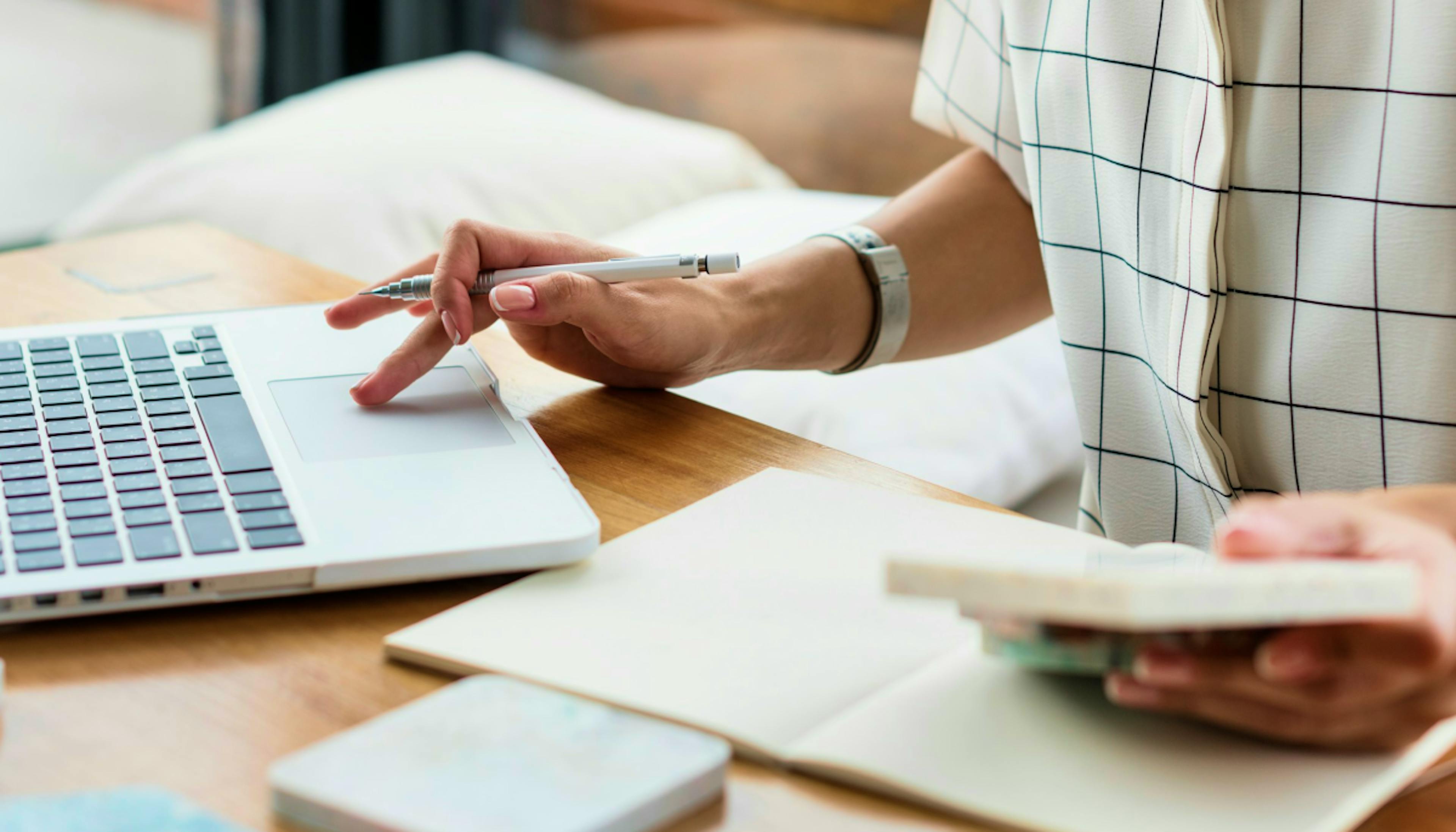 An accountant running numbers with a computer