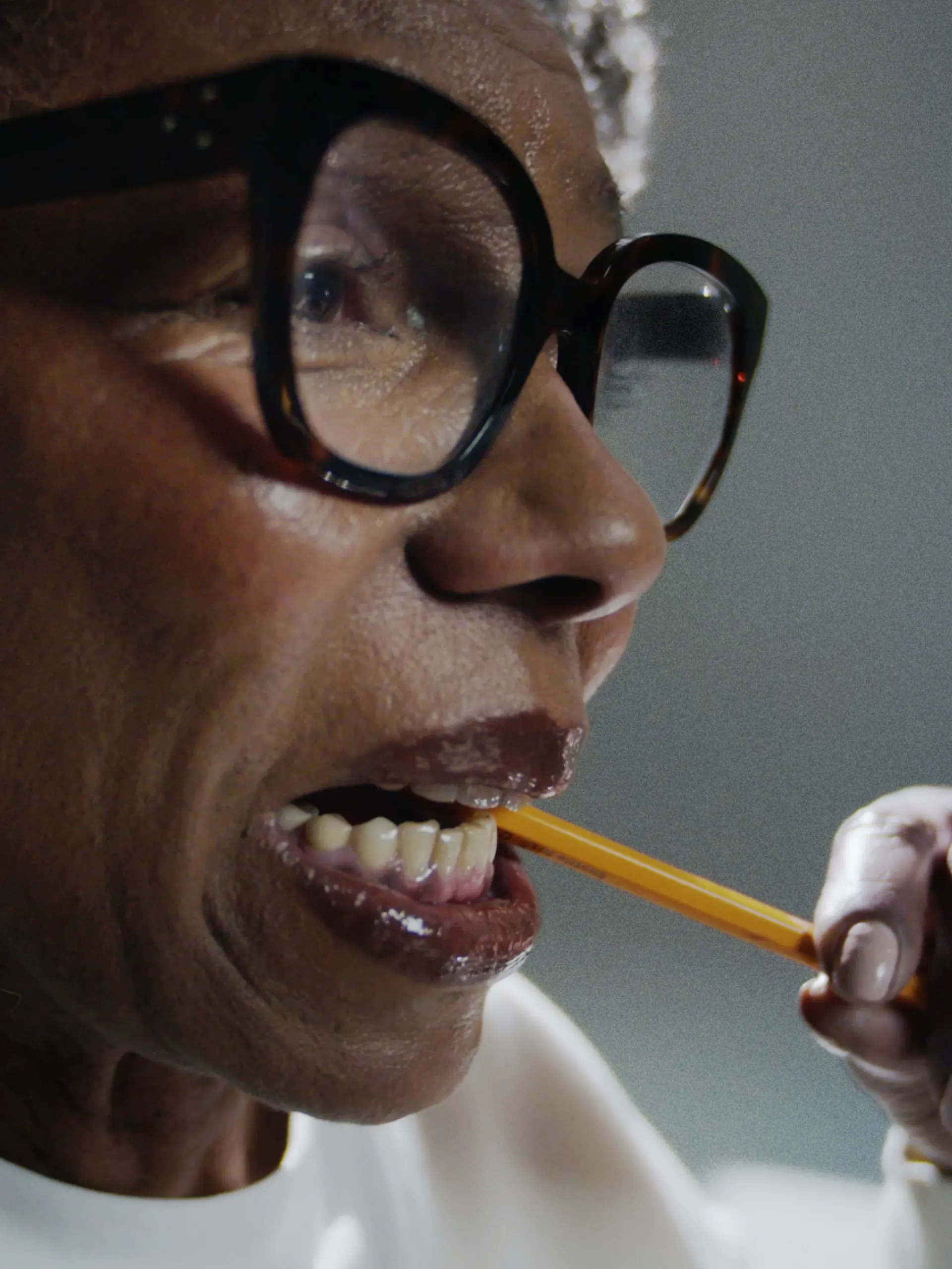 Catherine gnawing pencil