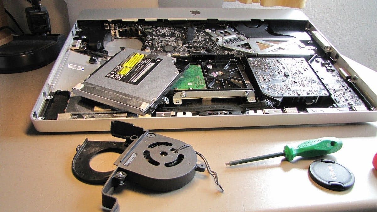 A laptop being repaired. To minimise the environmental and ethical impact of a laptop, is to keep your current one in circulation longer.