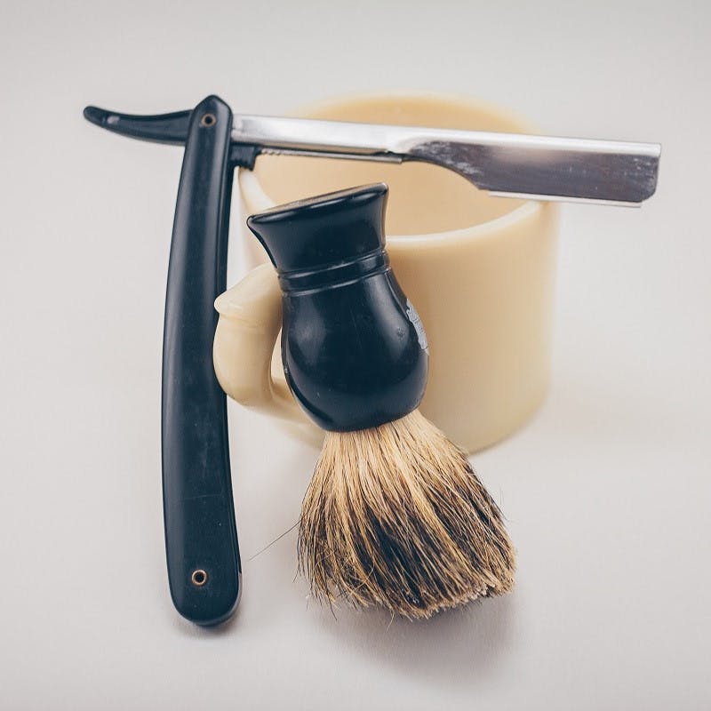 A cut razor and solid bar packaging free shaving cream. A regular trip to the barbers is a novel way to refuse single use plastic and living plastic free.