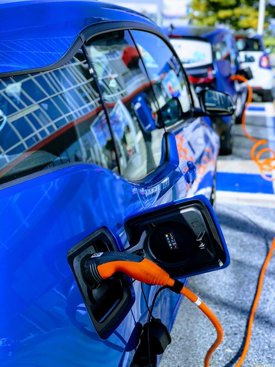 Two BEV electric vehicles charging