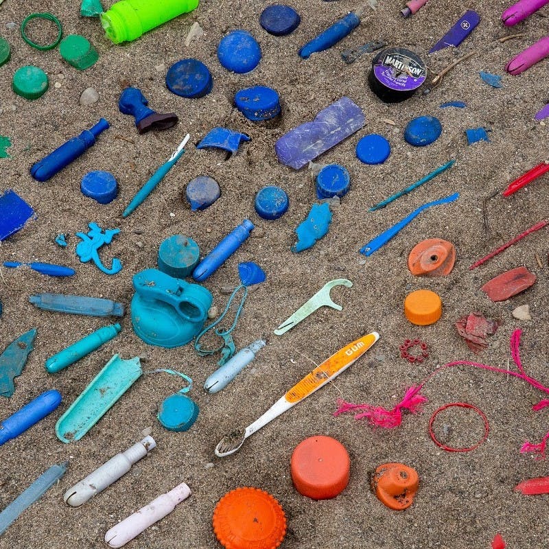 An assortment of colourful plastics found during a beach clean up.