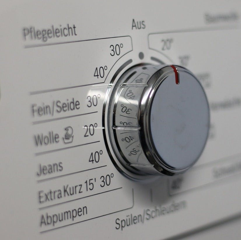 A close up image of a washing machine's different temperature settings. 