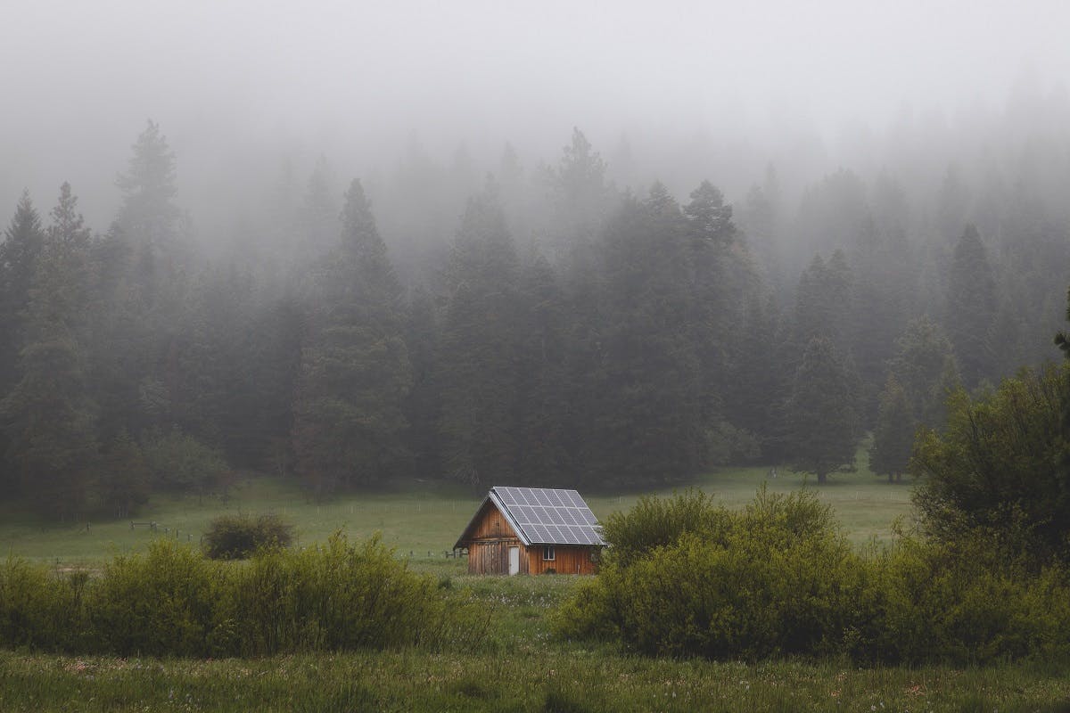 An off grid house using a DIY solar panel system for its energy.