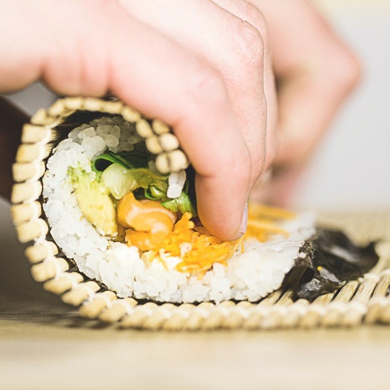 Sushi being made at home. Sushi is often a faveourite for pescatarians