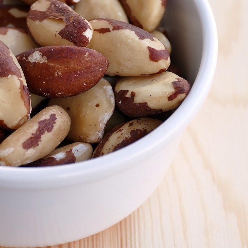 A bowl of brazil nuts. These nuts are an excellent source of selenium, which is often a concern when going vegan. 
