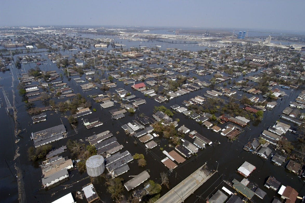 An aerial view of a flooded town. As climate change worsens, we are witnessing ever more floods, that are ever more severe.