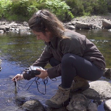 Hannah Kirkland conducting a freshwater pearl mussel survey at Alladale Wilderness Reserve.
