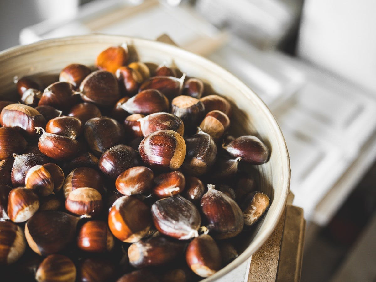 A bowl of chestnuts. Roasting chestnuts is an easy first step to eating seasonally and locally