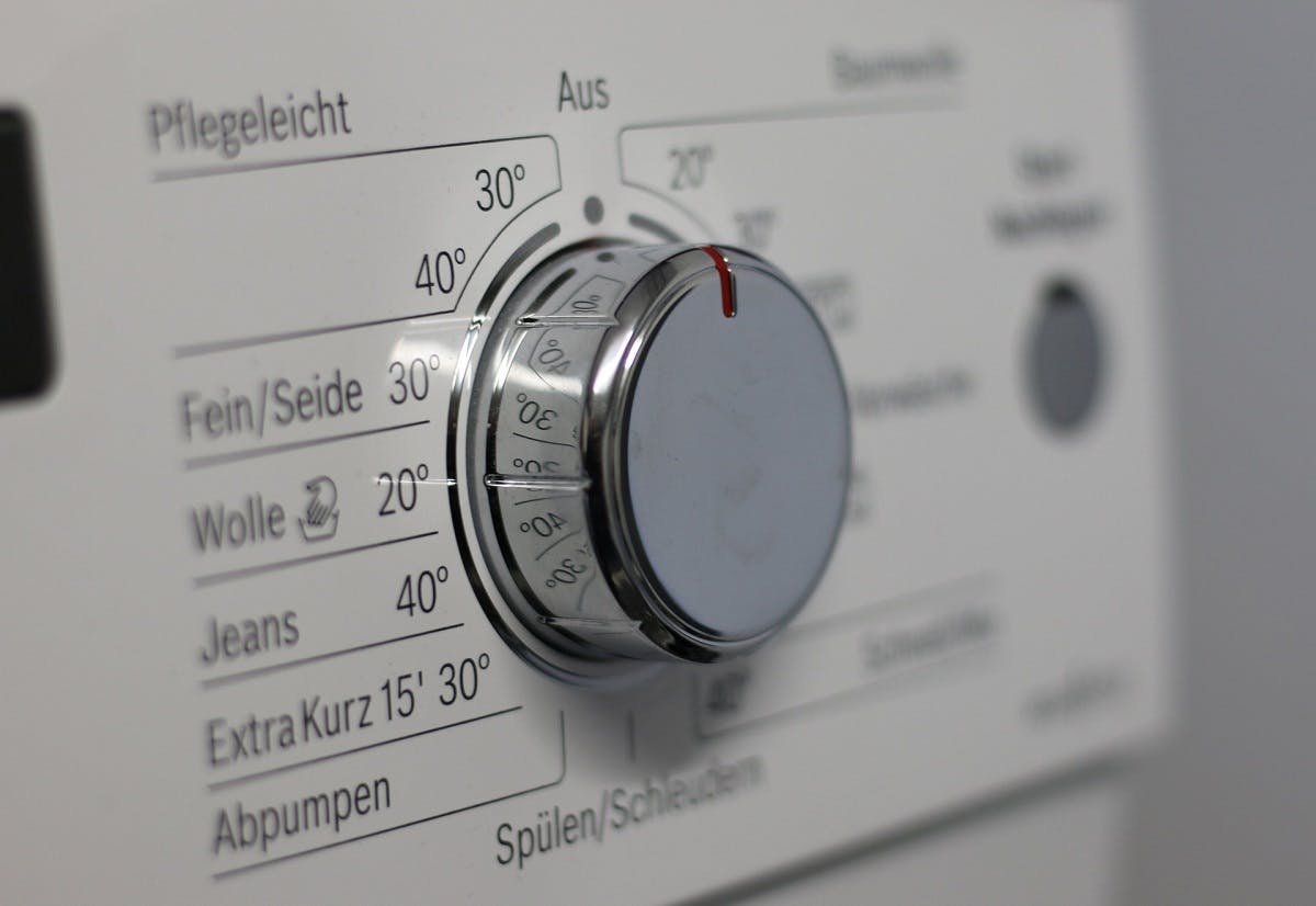 A close up image of a washing machine's different temperature settings.