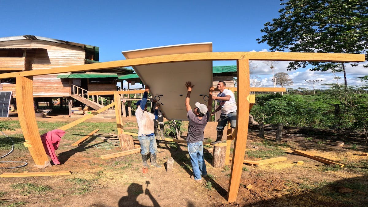 community members building a meeting space
