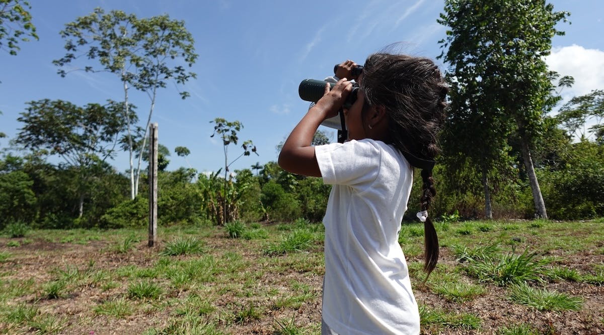 School child at mossy earth's community education event
