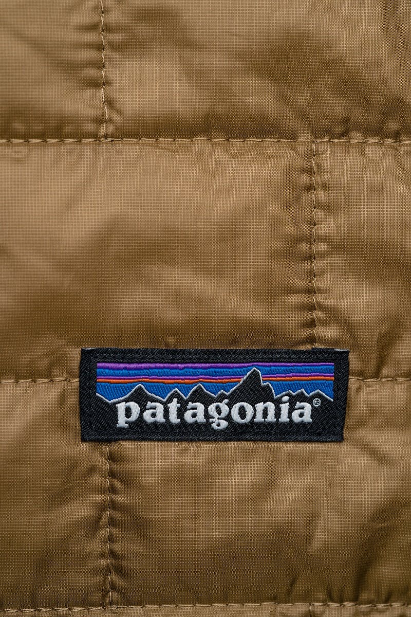 An item of clothing with a Patagonia badge stitched on.