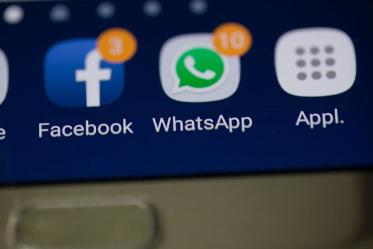 A screen shot of a phone with notifications on their Facebook and WhatsApp. Being easily distracted is one of the disadvantages of working from home.