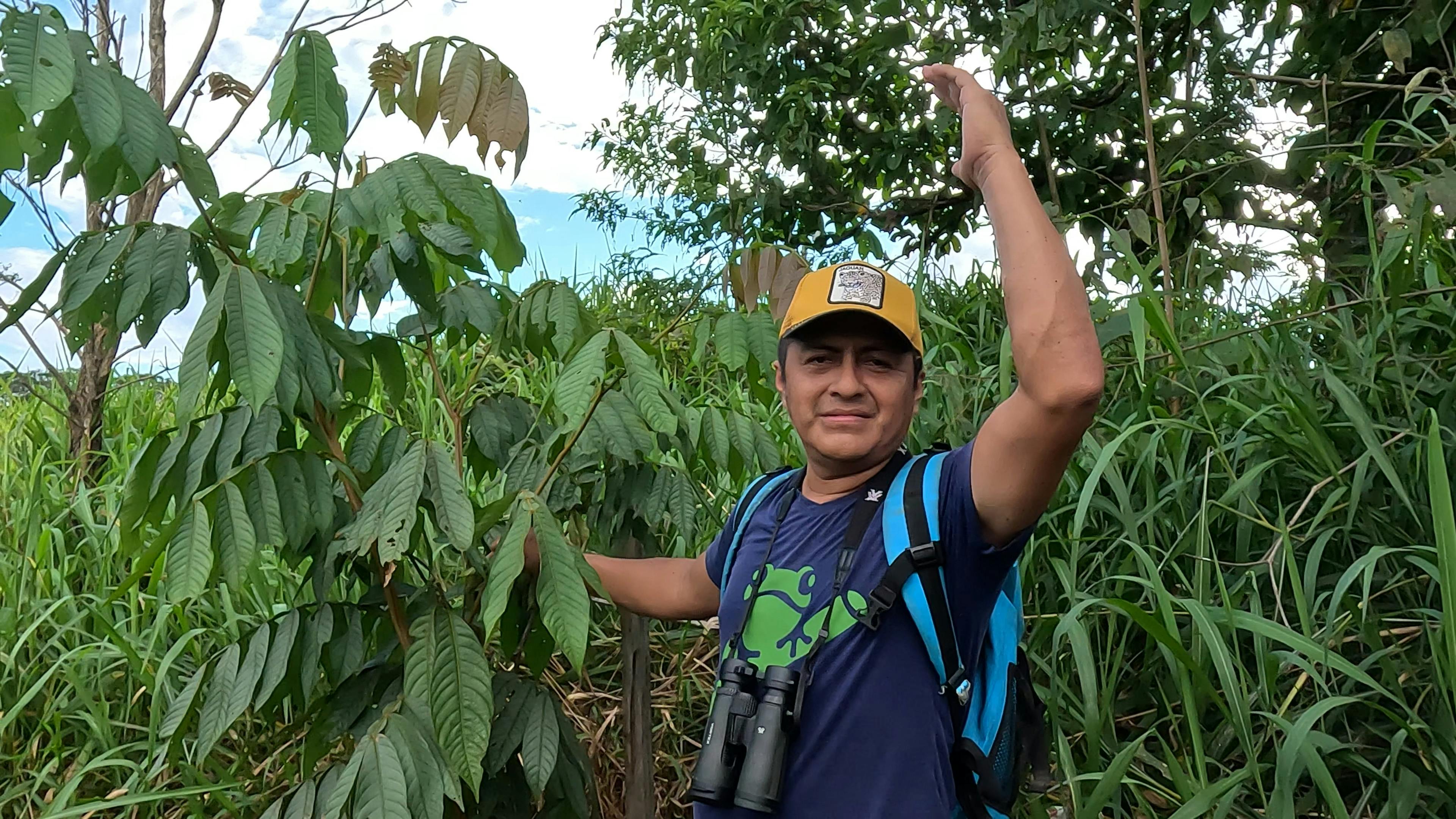 Fredy next to a young tree