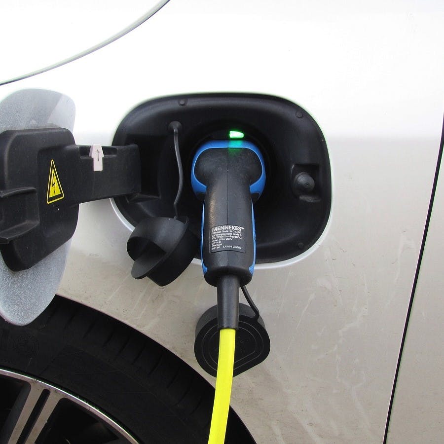 A hybrid car charging up its battery