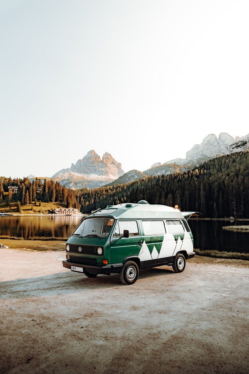 A camper van parked up in the wild taking advantage of solar power