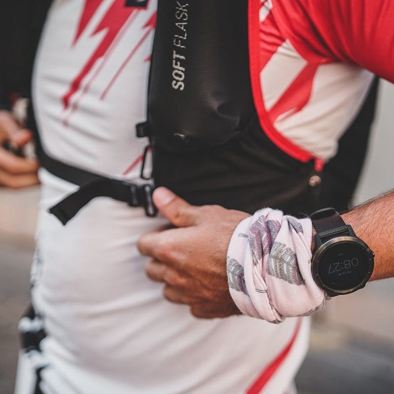 A man with Salomon backpack and Garmin running watch. The perfect accessories if you are to be running to work, cycling to work or walking to work regularly