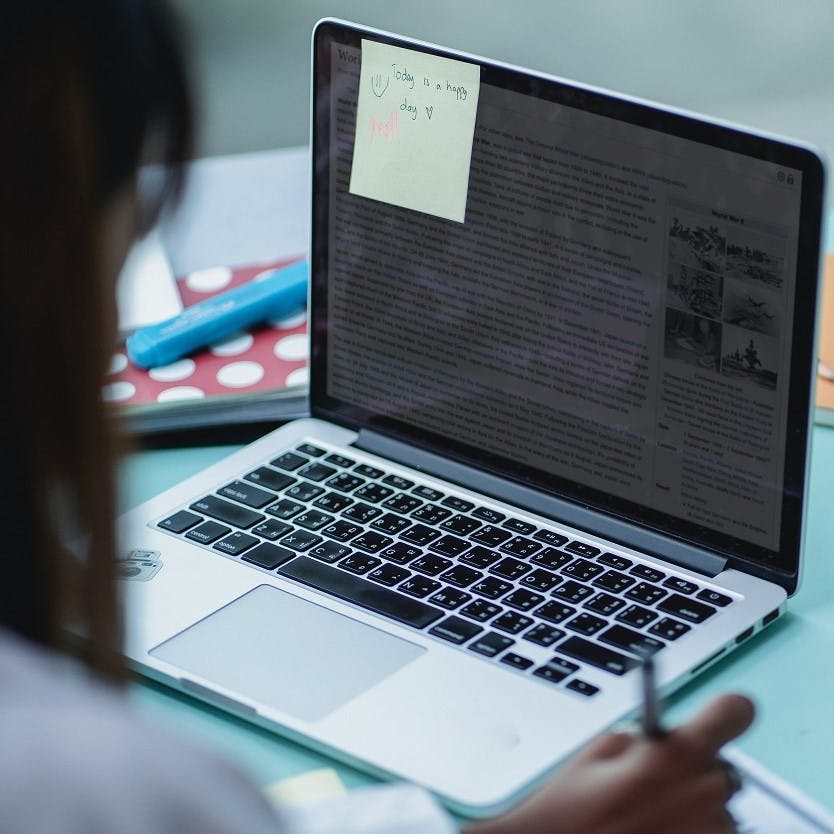 A girl studying online.