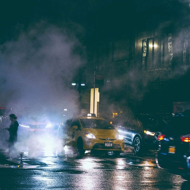 A traffic jam in a busy city at night