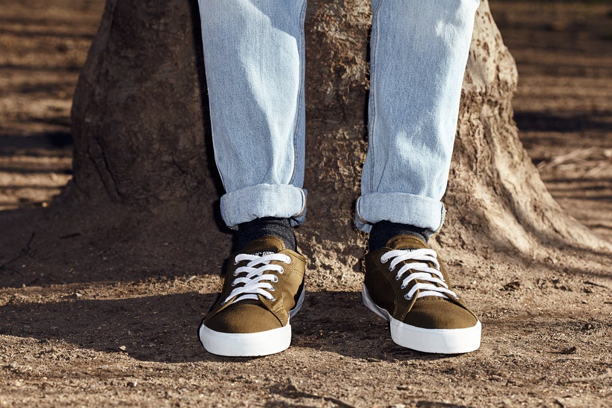 Somebody wearing a new pair of ethletic sneakers. ethletic is a sustainable and ethical brand of footwear
