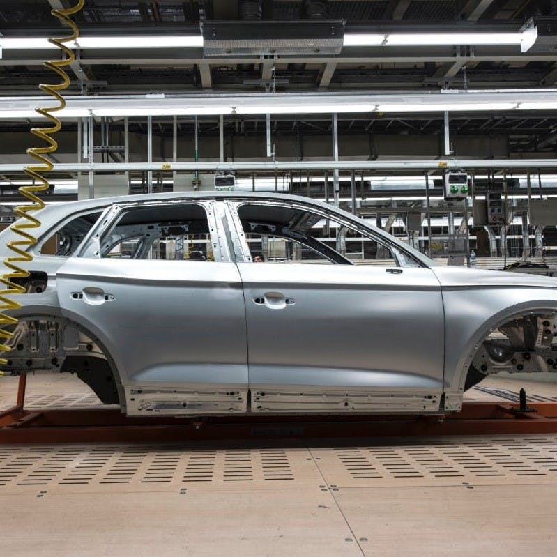 The chassis of a car at an assembly line. 