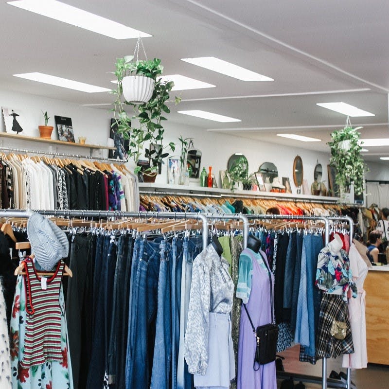 A high street charity shop selling pre-owned clothing