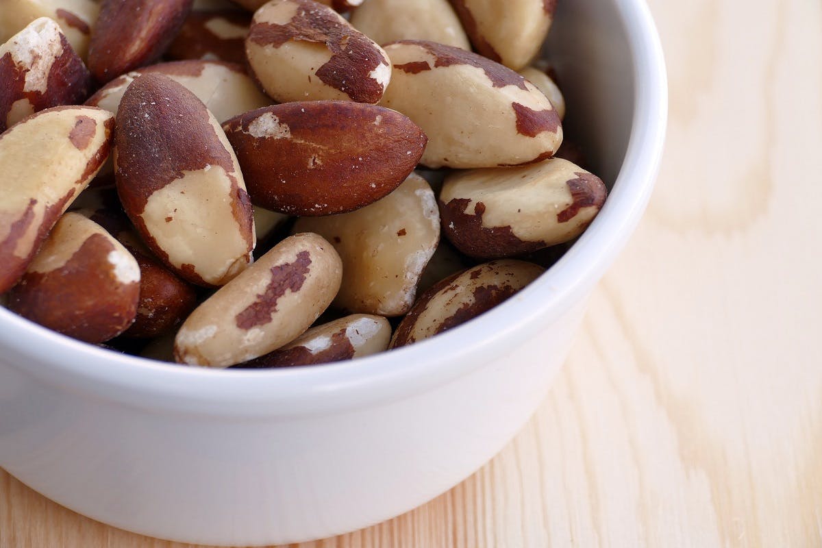 A bowl of brazil nuts. These nuts are an excellent source of selenium, which is often a concern when going vegan.