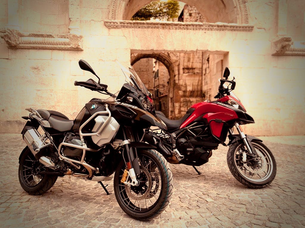 Rent a Ducati Multistrada to tour Croatia's Adriatic coast, explore historic cities like Dubrovnik and Split, head to neighboring countries for diverse cultural experiences and indulge in scenic mountain routes through the Dinaric Alps.