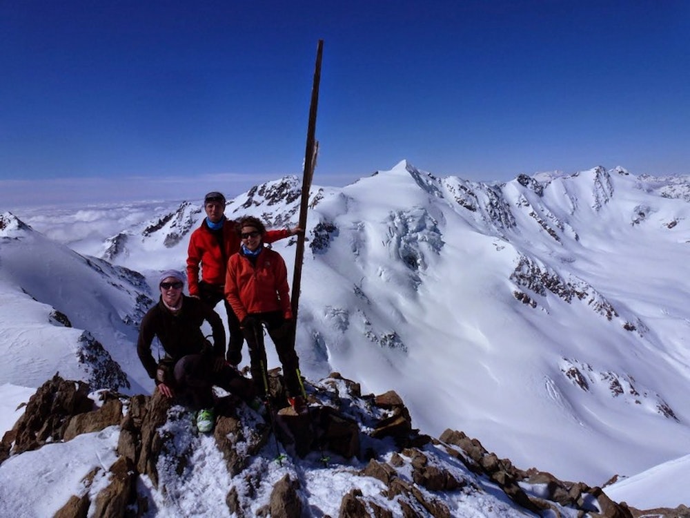 people standing on top of a mountain