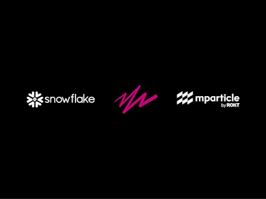 Three logos on a black background representing a tech partnership: Snowflake's white snowflake icon and name on the left, a magenta zigzag line in the center symbolizing the Rokt connector, and Rokt mParticle's white logo with the text “mparticle by ROKT” on the right.