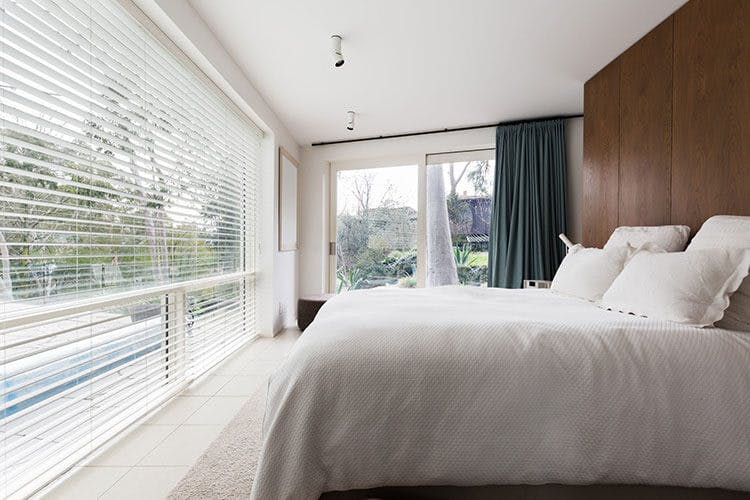 classy white wood venetians - bedroom 