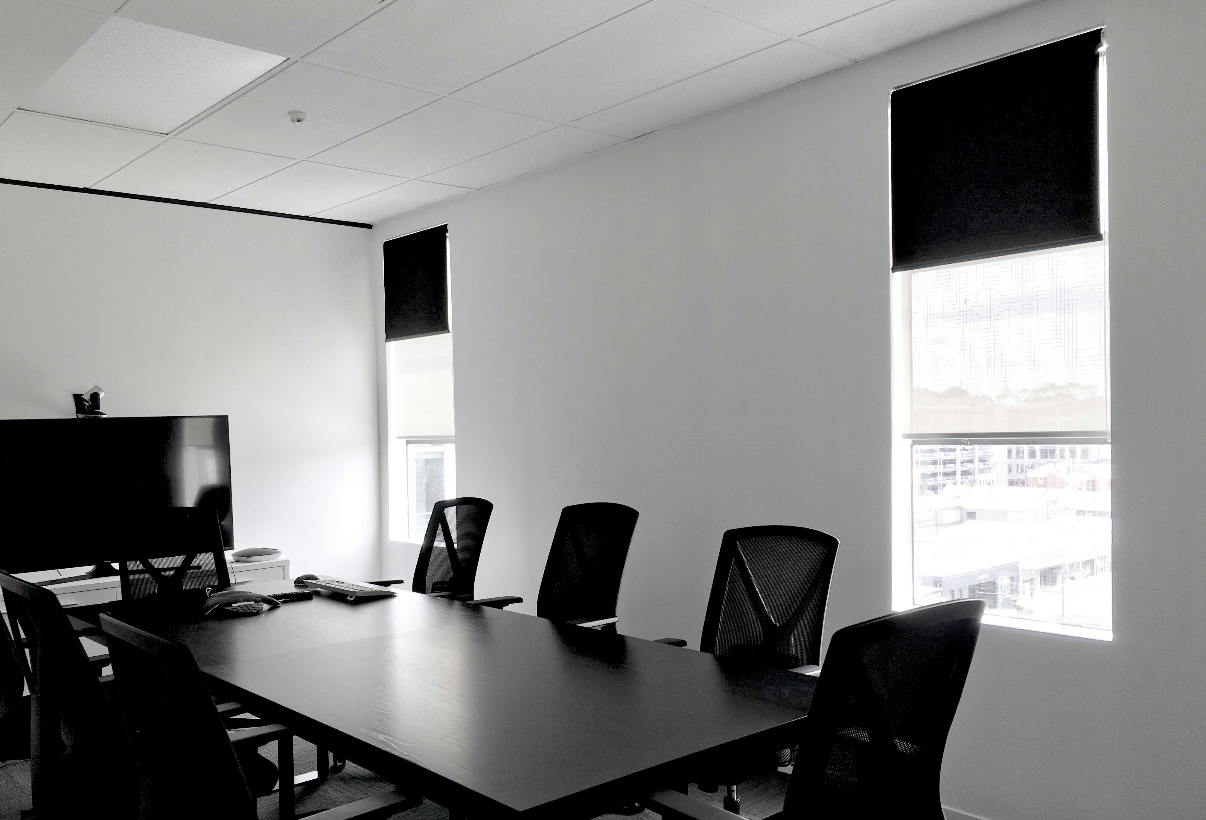 Dual roller blinds in office boardroom nz