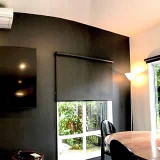 Black blockout blinds in media room - mr blinds nz