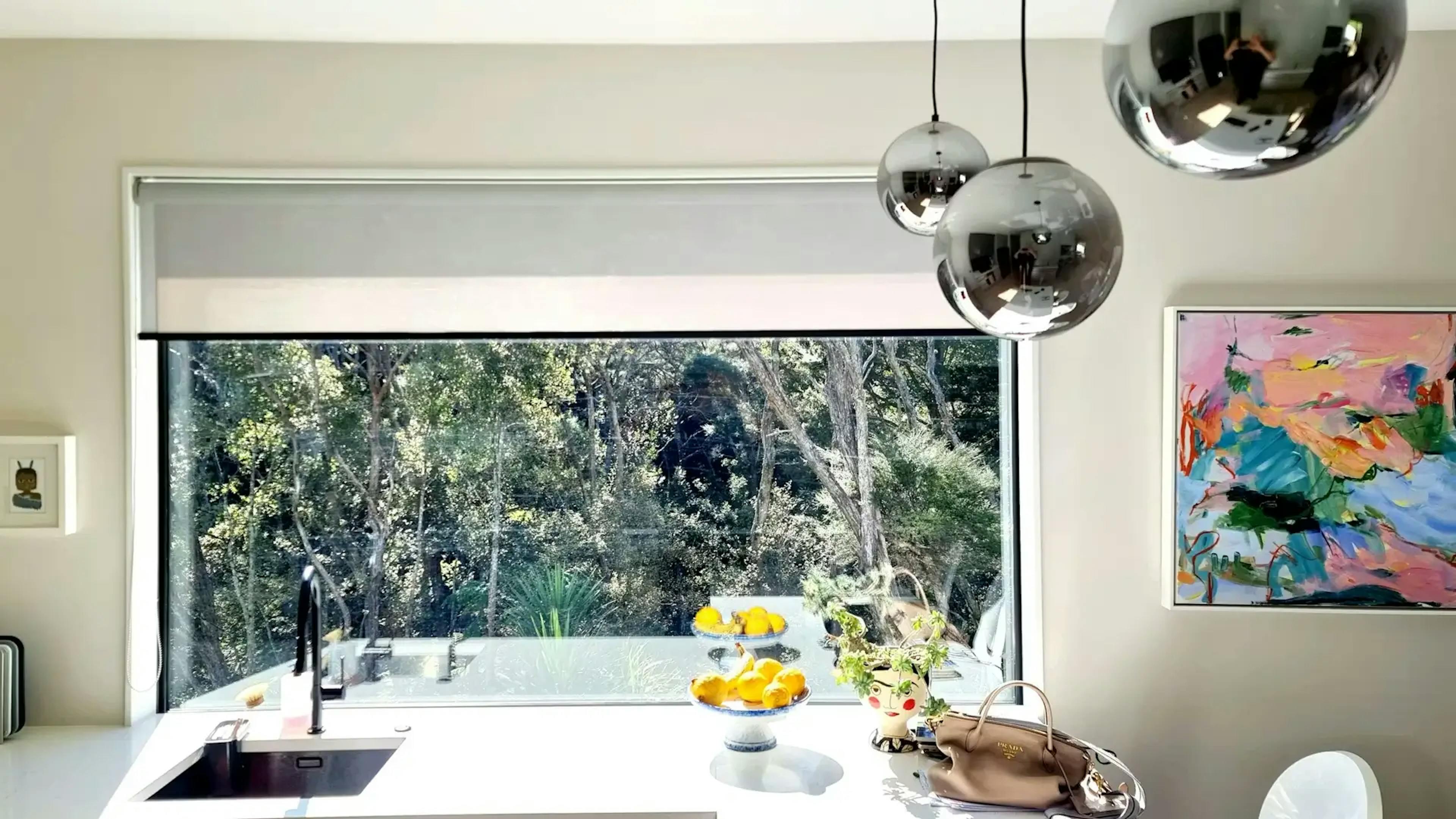 Kitchen window with grey blind