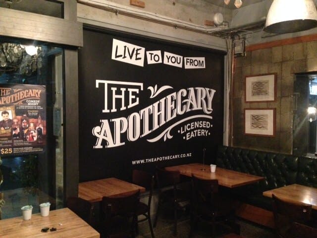 Roller blind with shop logo printed on it