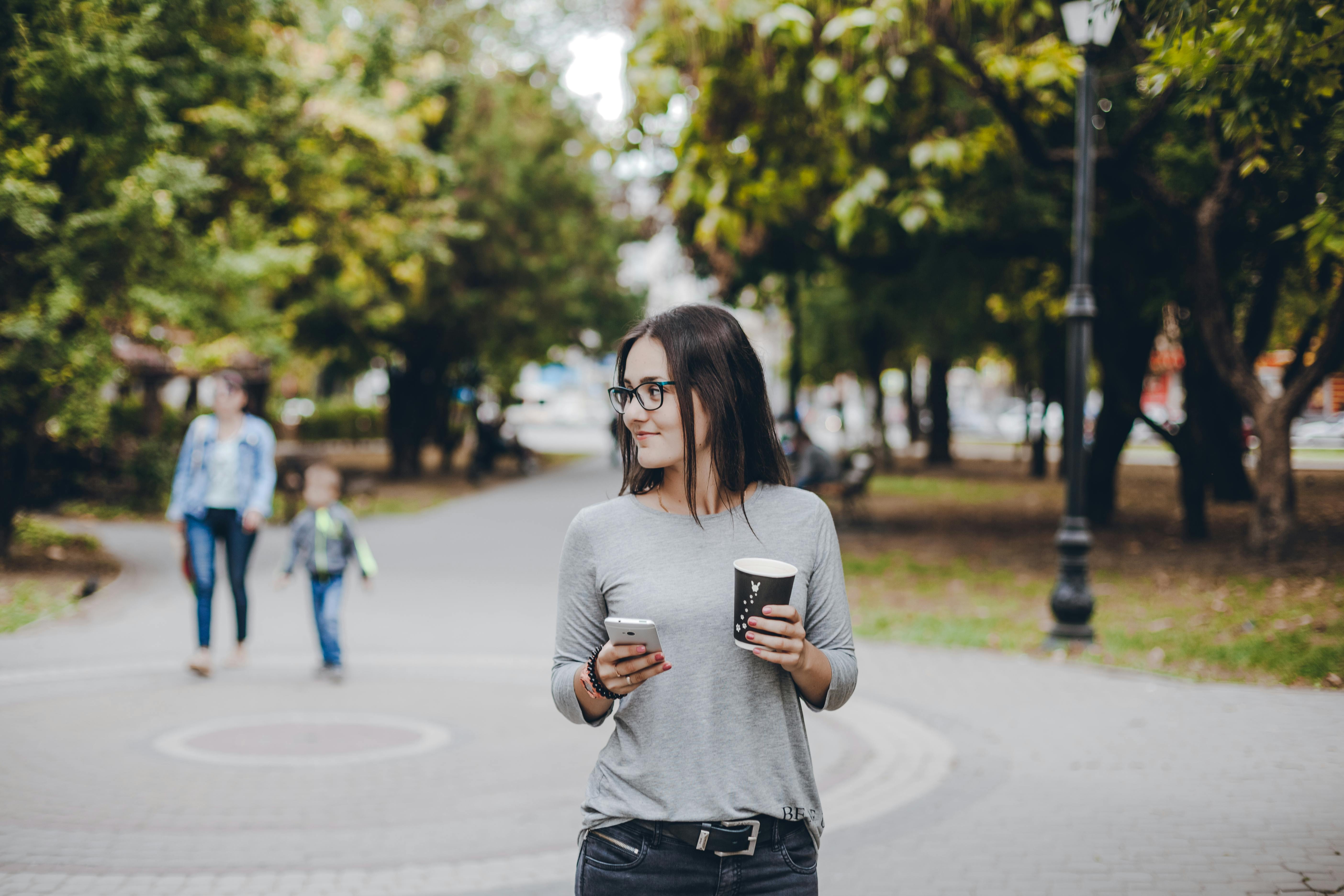 woman walking in a park